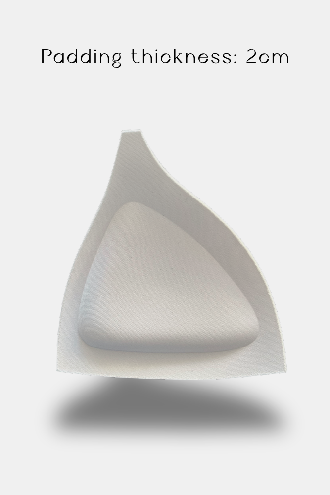 A white teardrop-shaped foam insert with a text overlay at the top reading 'Padding thickness: 2cm' on a light gray background.